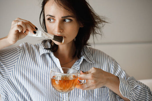 Woman with Tea Cup and Refresh Tea Stick