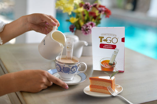 TGO English Breakfast Pack with slice of cake and pouring tea